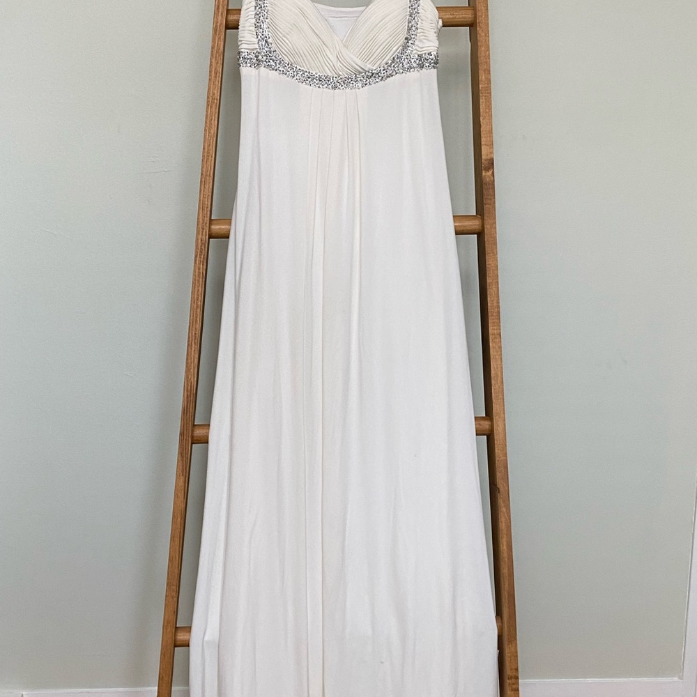 Elegant Off-White Gown with Silver Beaded Accents
